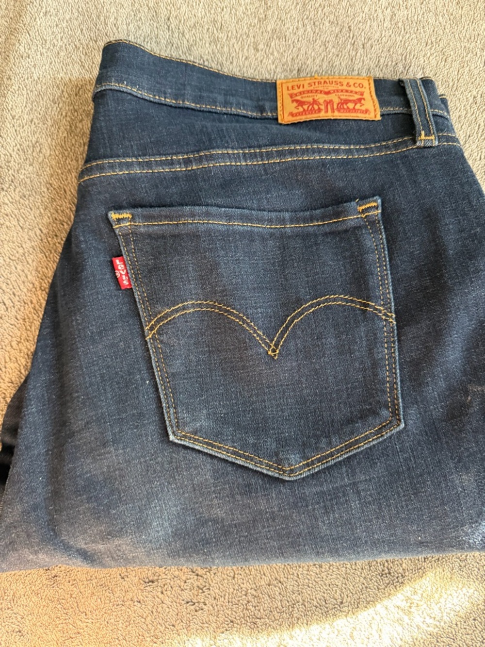 Levi's Men's Dark Blue Slim Straight Jeans with Signature Pocket Stitch